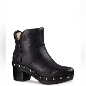 UGG Women's Black leather Heeled Boots with Studded Detail and sheep interior.